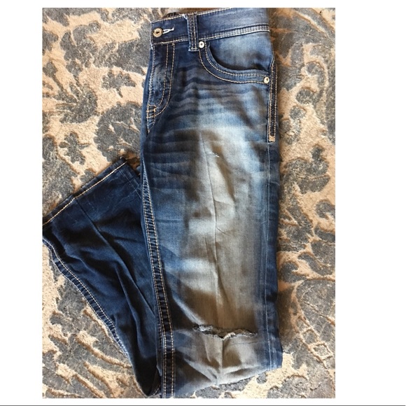 buckle ripped jeans policy